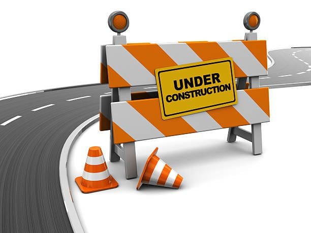 3d illustration of under construction barrier and asphalt road 3d illustration of under construction barrier and asphalt road